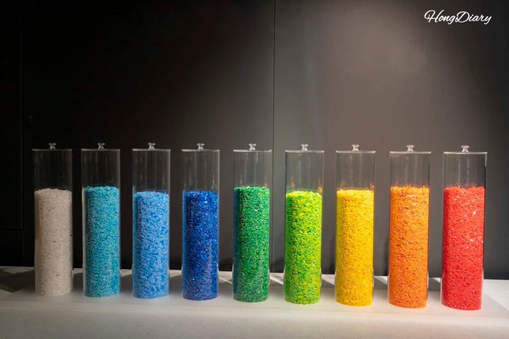 Colorful glass cylinder installation on display at F1963 Busan
