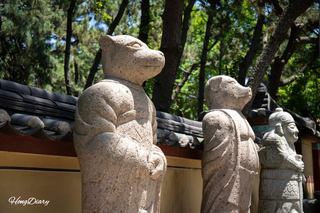 Stone zodiac statues at the entrance of Haedong Yonggungsa