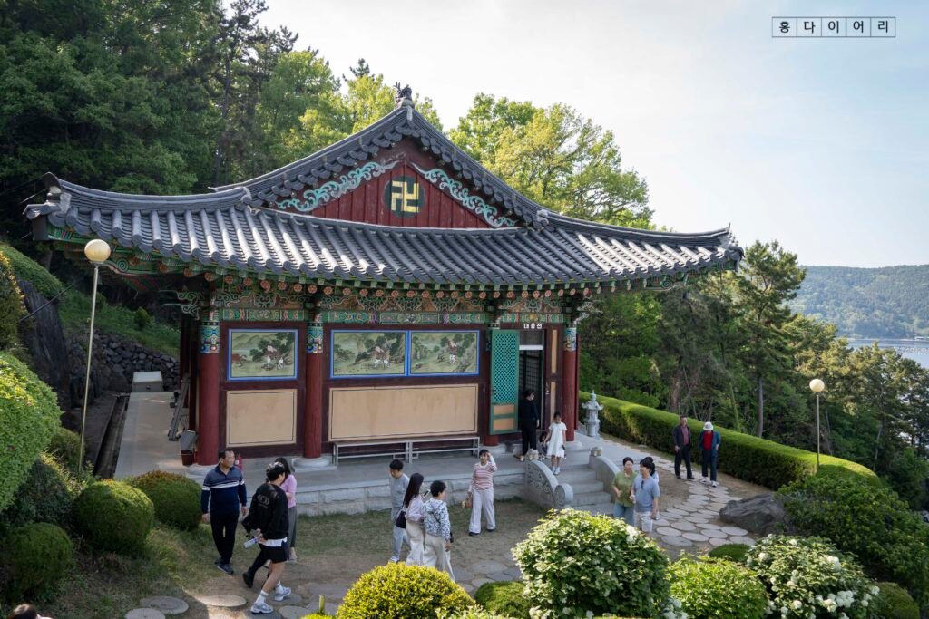 Traditional Korean temple architecture at Jangsu Temple overlooking the sea