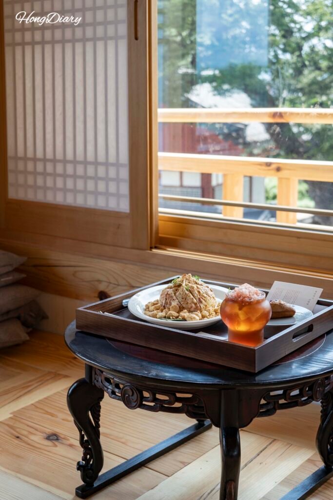 Signature desserts and drinks on floor seating table at Bichae Bogette, Gyeongju