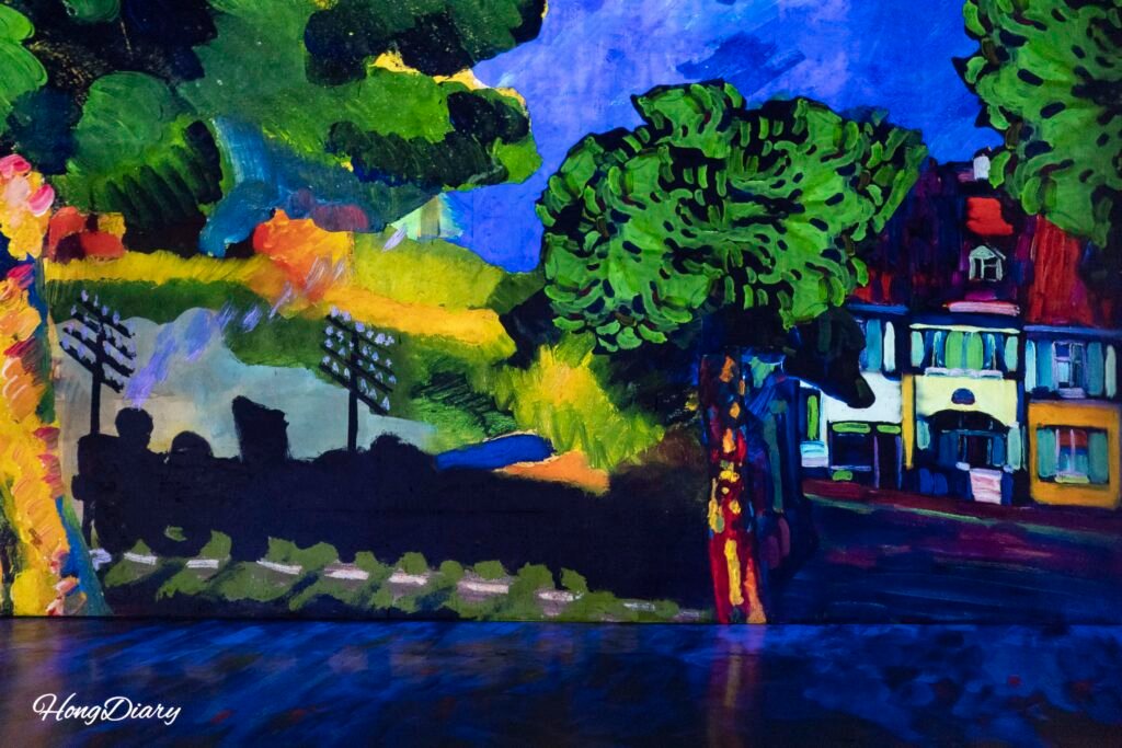 Visitors experiencing immersive projection art at Bunker des Lumieres Jeju