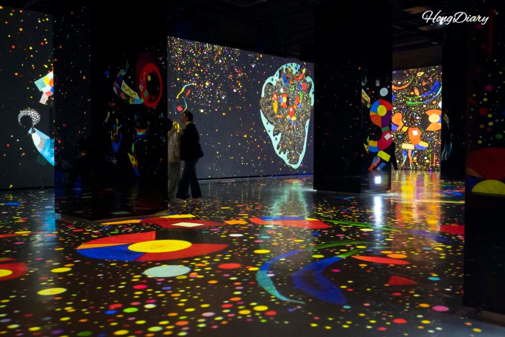 Abstract art projection covering entire interior of Bunker des Lumieres Jeju