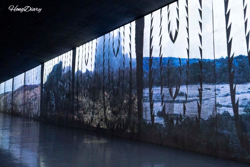 Immersive media art projection inside Bunker des Lumieres Jeju