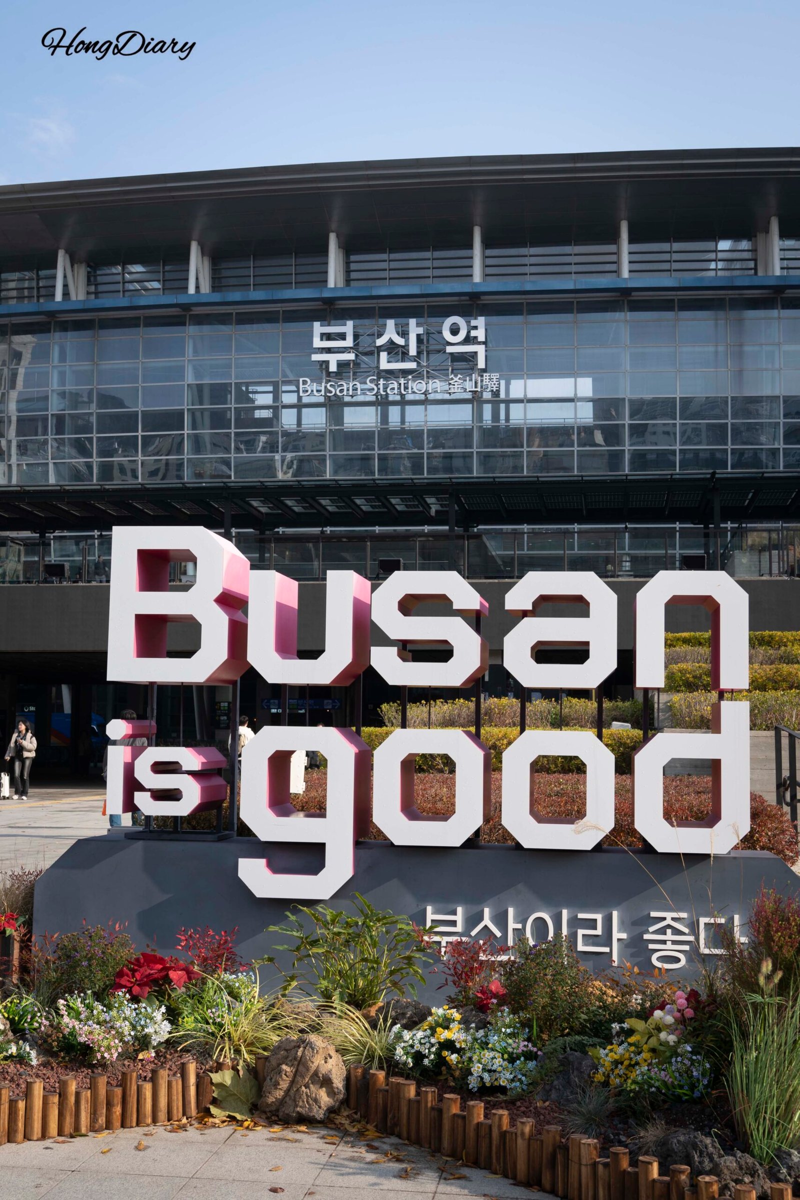 Busan city logo and Busan Station KTX train station exterior