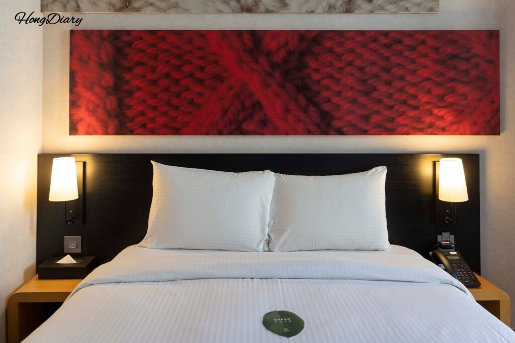 Bed in guest room at Central Seven Hotel Busan soft and comfortable