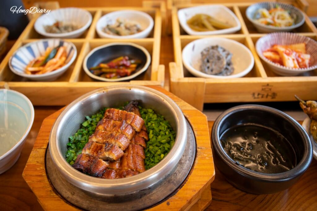 Eel dolsot rice pot at Handassot Gyeongju with banchan side dishes