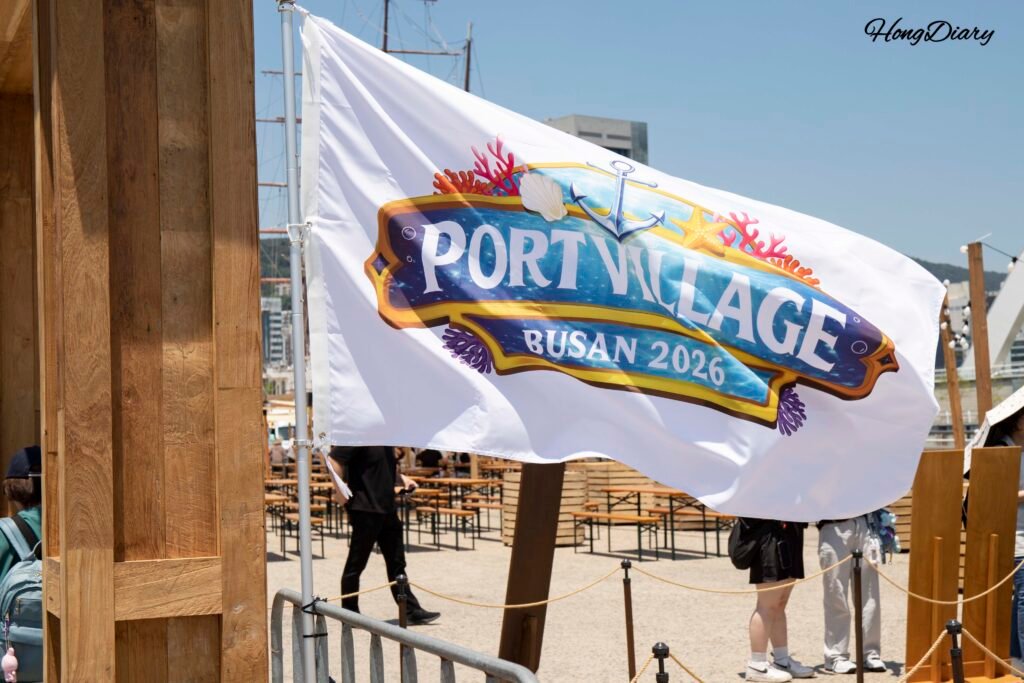 Port Village Busan 2026 festival banner at Pier 1