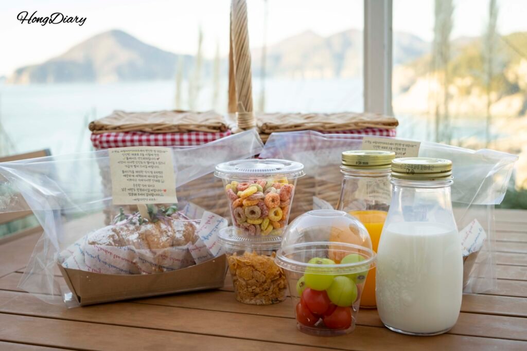 Breakfast room service in a picnic basket at Windyhill Resort, Geoje