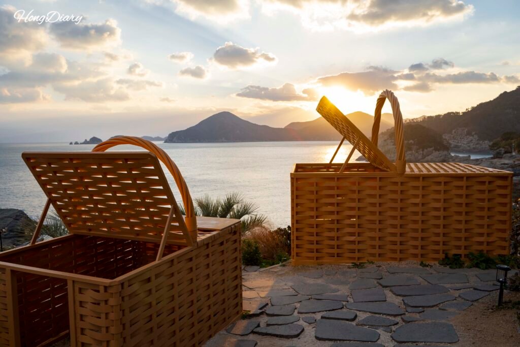 Garden photo spot with picnic basket at Windyhill Resort, Geoje