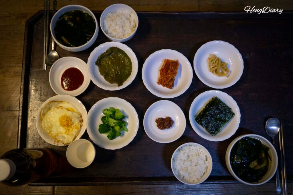 Korean breakfast spread served at Yangsajae Jeonju including rice, kimchi and side dishes