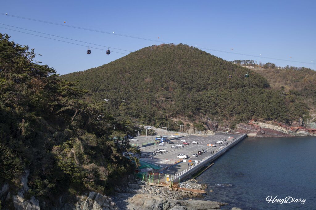 Amnam Park public parking lot seen from the Songdo Yonggung Cloud Bridge area, Busan