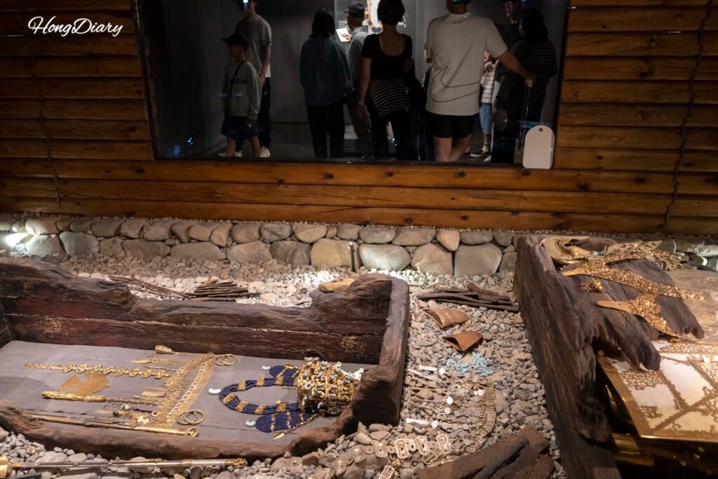 Interior of Cheonmachong Tomb in Gyeongju showing Silla dynasty artifact displays and the burial chamber structure