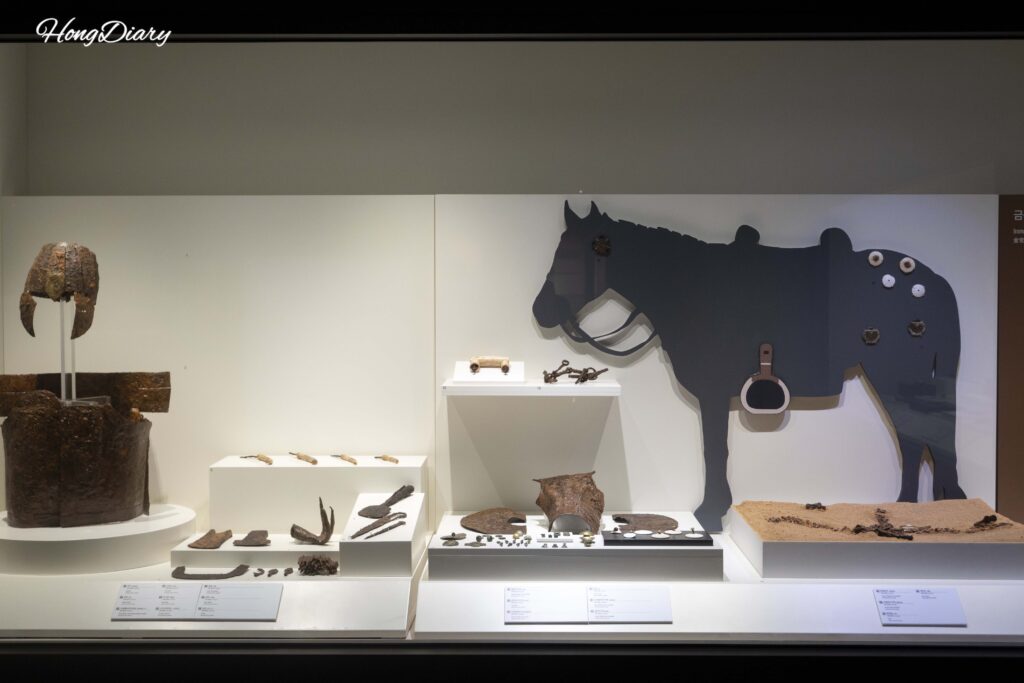 Ancient trade artifacts from the Daeseong-dong Tombs including bronze and iron objects