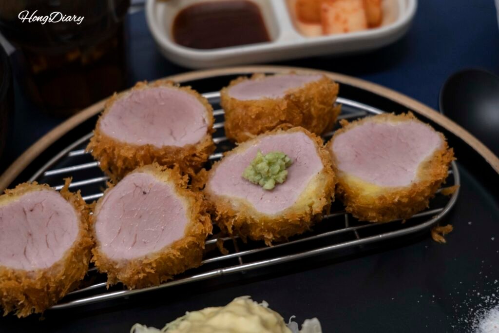 Hire katsu topped with wasabi at HETZ Gwanganli — no heavy sauce needed