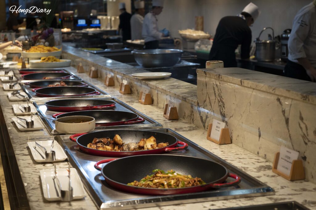 Hot food section at The Buffet at Inter-Burgo Daegu with international dishes
