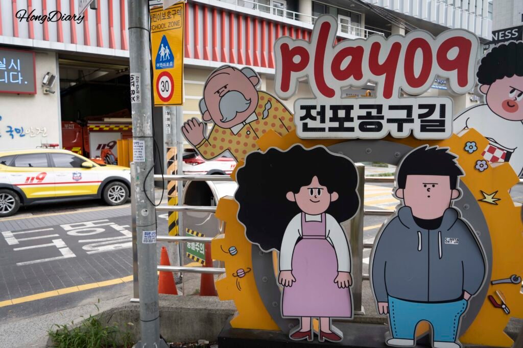 Jeonpo Tool Street Busan mural arte callejero foto