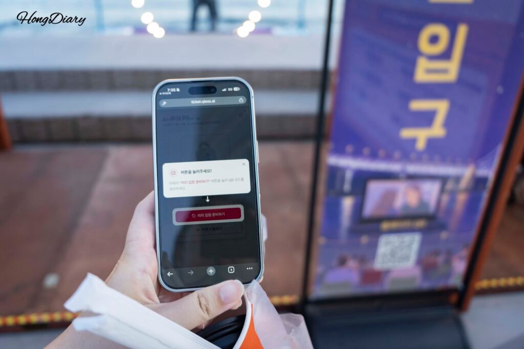 Mobile ticket with QR code for Millak Ocean Cinema on a smartphone screen