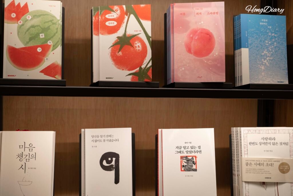 Curated book shelves at the Arc N Book bookstore inside Podium Dive Gwangalli