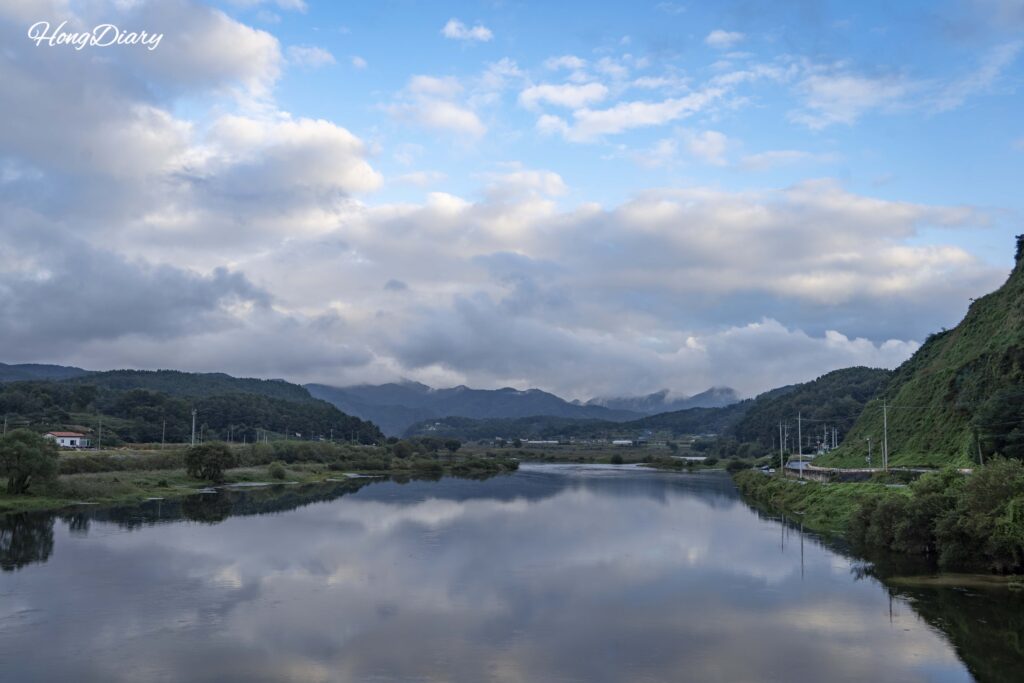 Geum River viewed from Samrakwon Observatory with rice paddies and mountains in the background