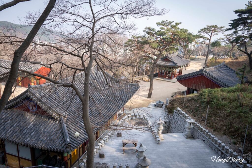 Overhead view of Seonamsa Temple nestled into the slopes of Baegyangsan Mountain, Busan