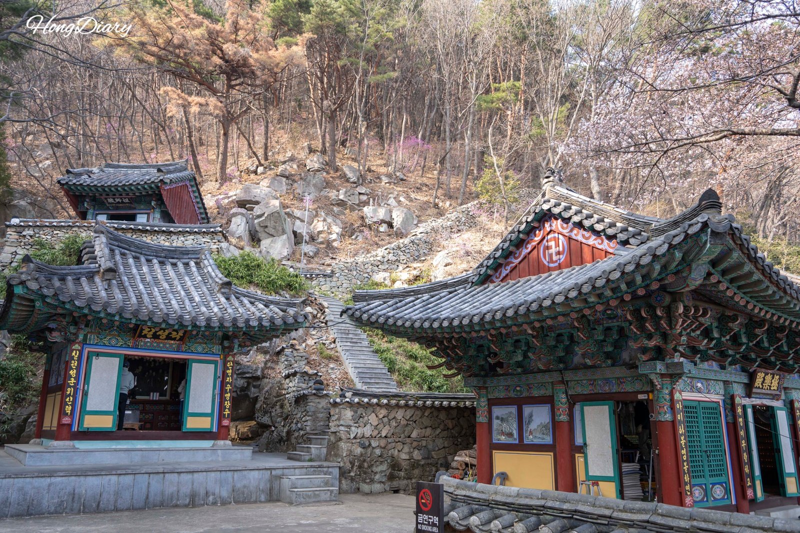 Traditional Buddhist architecture surrounded by trees at Seonamsa Temple on Baegyangsan Mountain