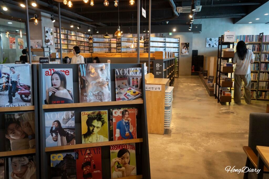 Interior of Tea & Books Gwanganli with magazine shelves and seating