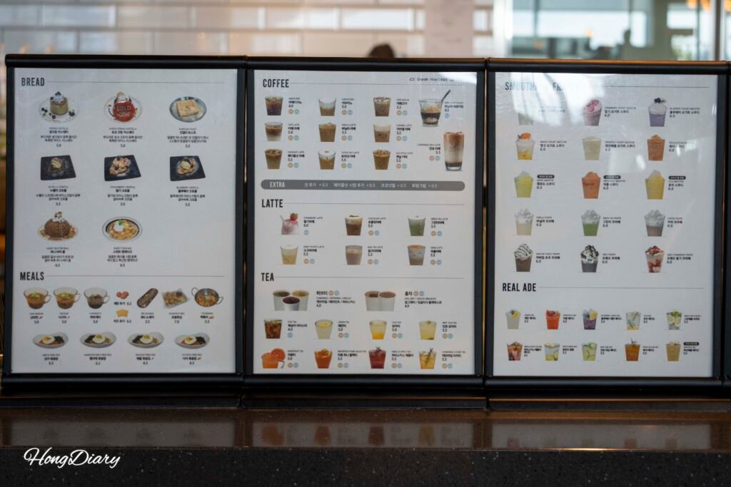 Full menu board at Tea & Books showing drinks, meals, and desserts