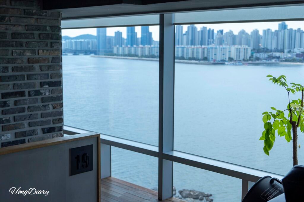 Ocean view of Gwanganli Beach and Gwangan Diamond Bridge from the 8th floor of Tea & Books cafe
