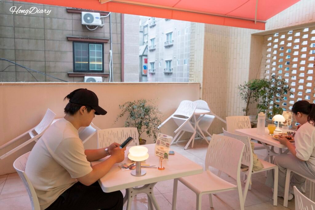 Covered terrace seating at Yeonhwa Dupbab Busan