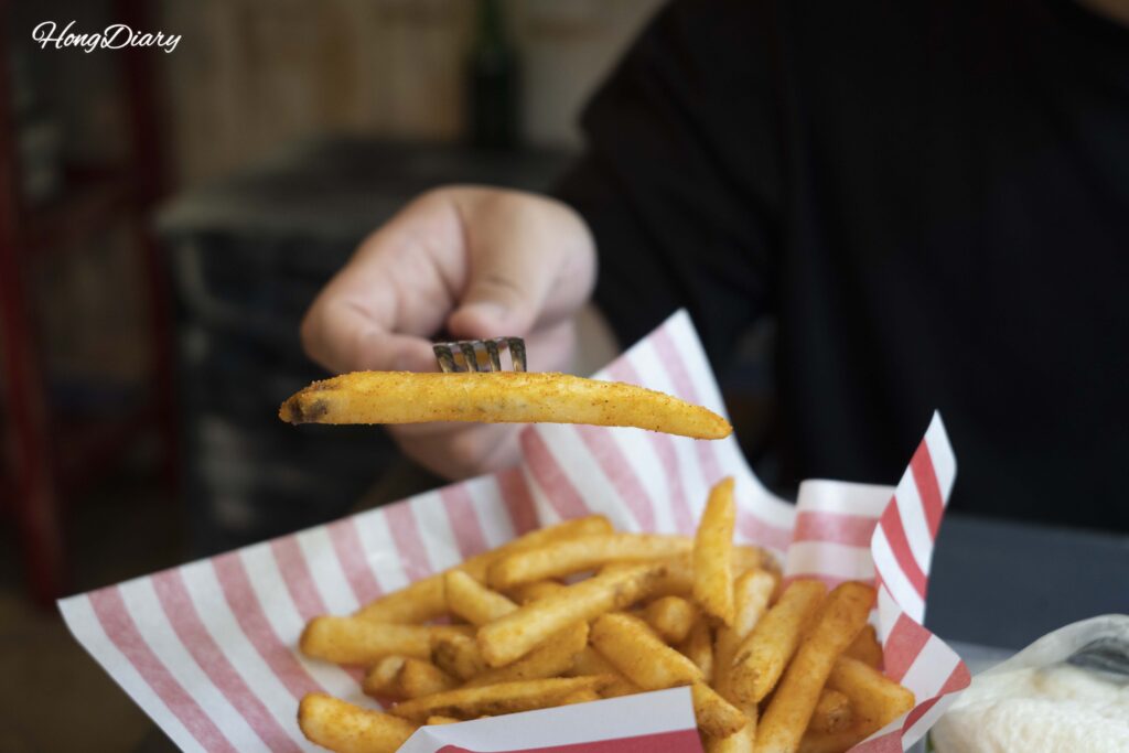 Large seasoned french fries served at Bao Burger Songjeong in Busan