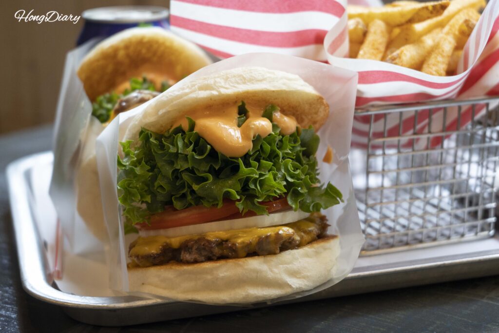 Close-up of the signature white bun at Bao Burger Songjeong showing its soft, pillowy exterior