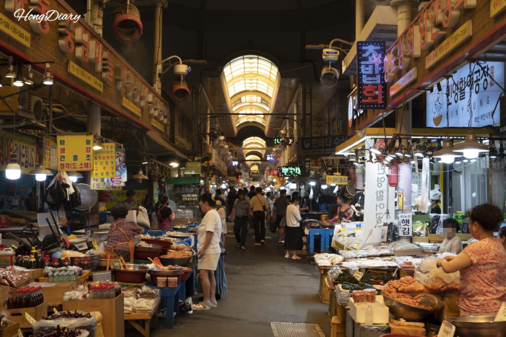 Walking through the alleys of Bujeon Market Busan while searching for hidden puzzle clues