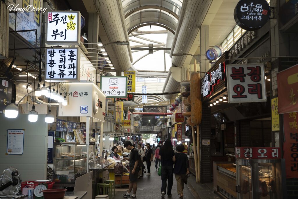 Narrow alley inside Bujeon Market Busan during the Mystery Market outdoor escape room
