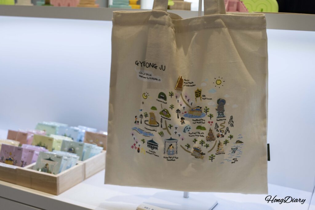 Gyeongju-themed eco-bag merchandise for sale at the Flashback Gyerim gift shop