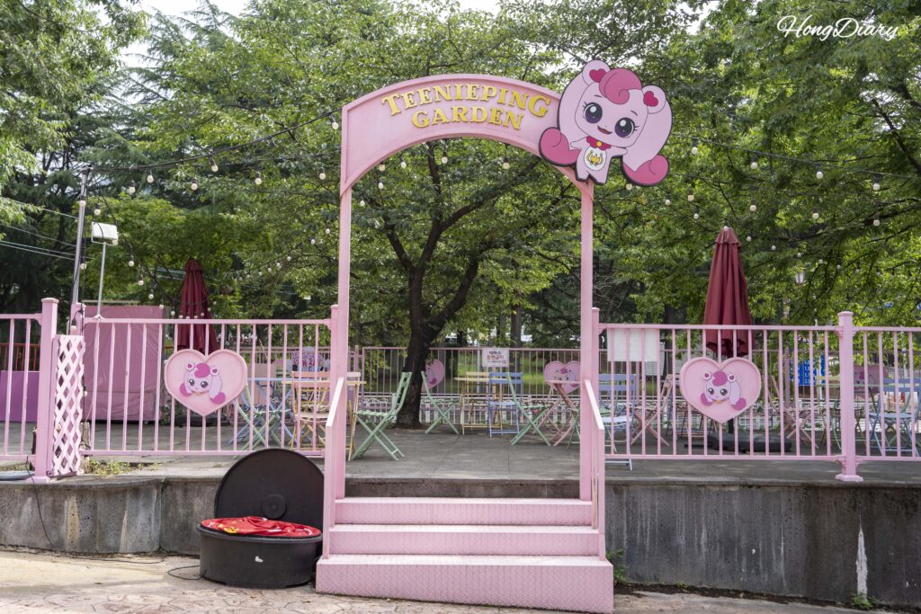 TiniPing character garden at the entrance of Geumo Land