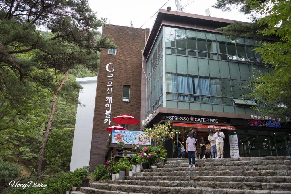 Full view of the Geumosan cable car station building at the lower boarding area in Gumi