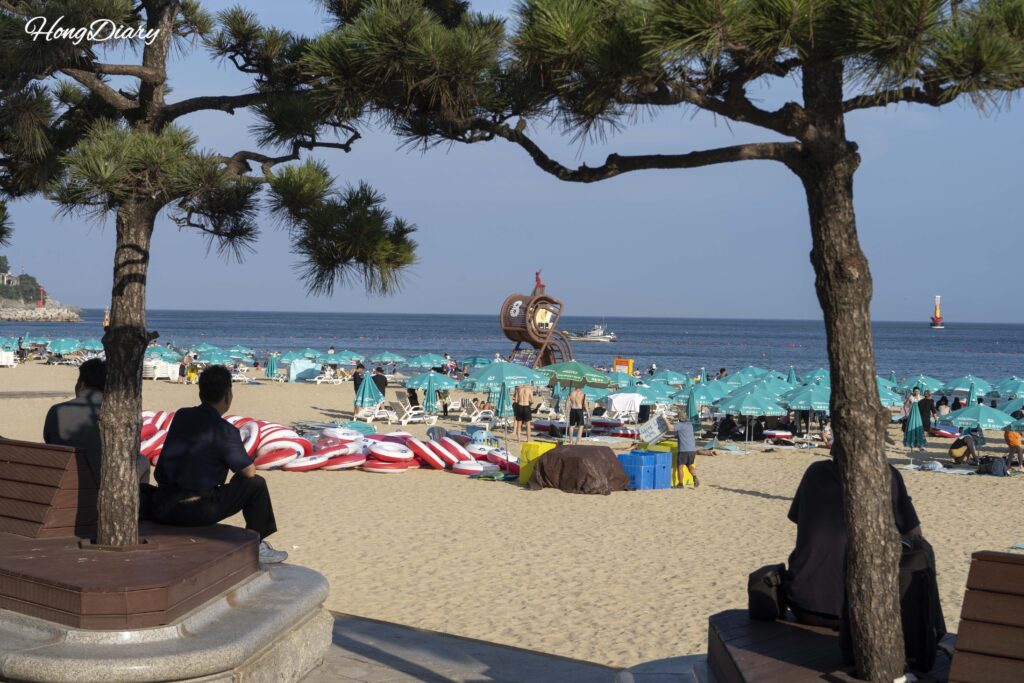 Parasols and tubes available for rent on Haeundae Beach, Busan