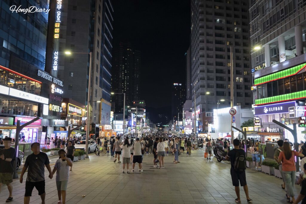 Gunam-ro main street leading from Haeundae Beach toward the ground fountain
