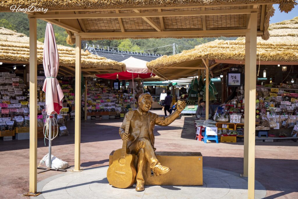 Photo zone featuring singer Jo Young-nam at Hwagae Market