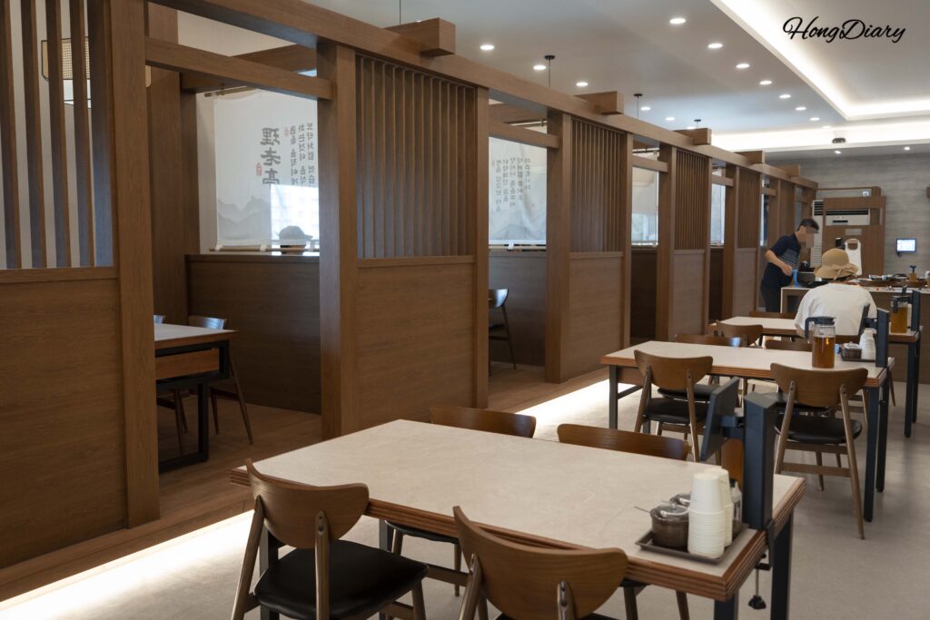 Interior of Irojeong Gumi showing the main dining hall and private room seating area