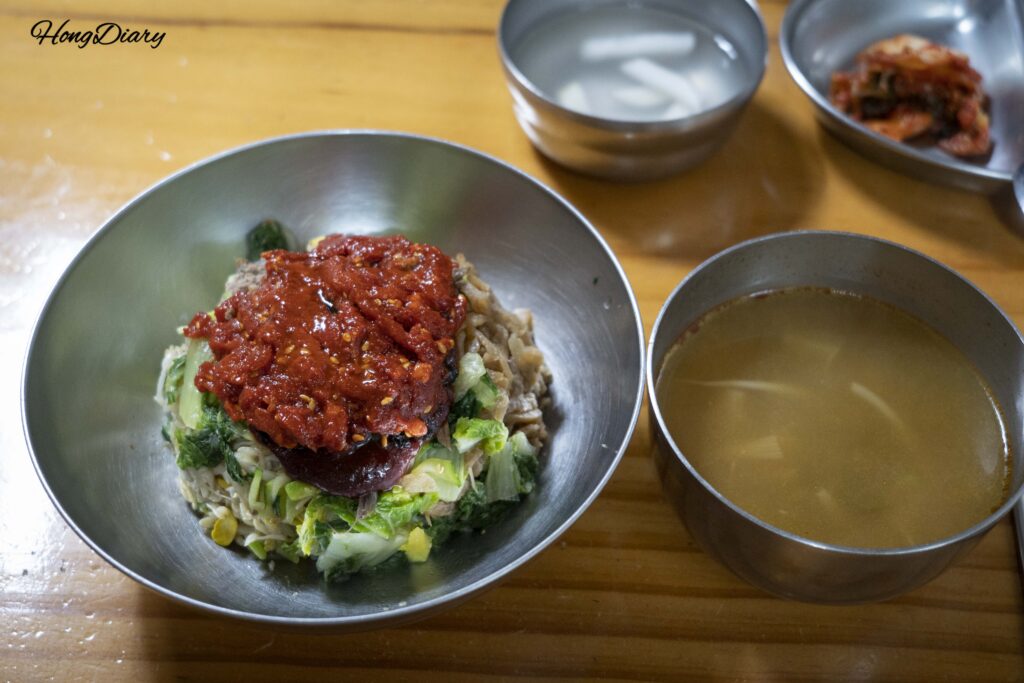 Jinju-style yukhoe bibimbap (beef tartare rice bowl) served with seonji-guk (beef blood soup) at Jeil Restaurant in Jinju Jungang Market