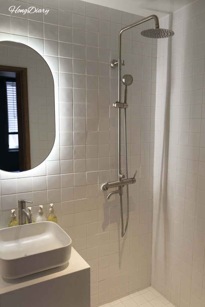 Another angle of the bathroom showing shower area at Kukjejang Hotel