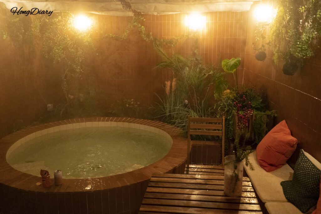Private jacuzzi at Kukjejang Hotel at night with atmospheric fog and lighting