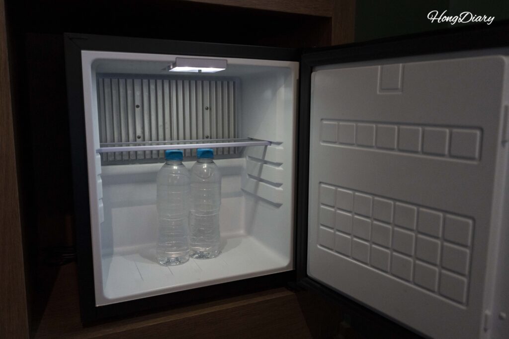 Mini refrigerator with complimentary bottled water at Kukjejang Hotel