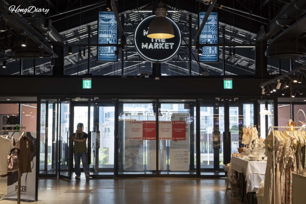 Interior of Millac The Market showing multiple shops and walkways
