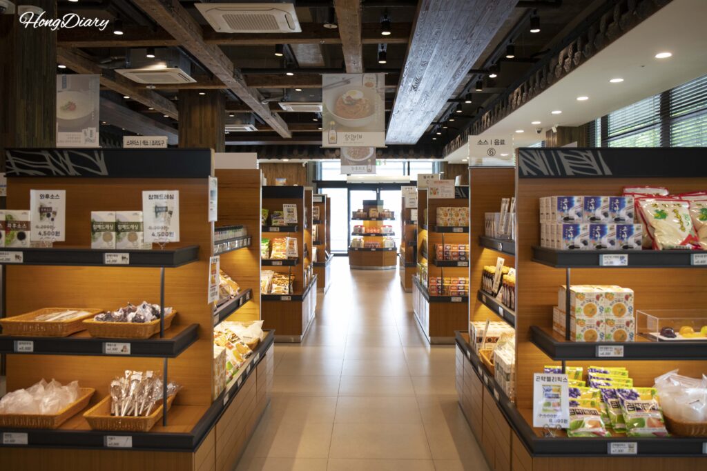 Inside the agar product gift shop at the Miryang Agar Theme Park showing packaged yangaeng and jelly products