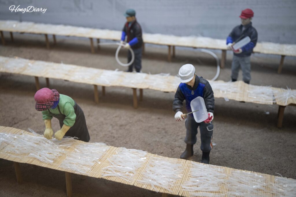 Miniature diorama showing the step-by-step agar production process at the Miryang Agar Museum