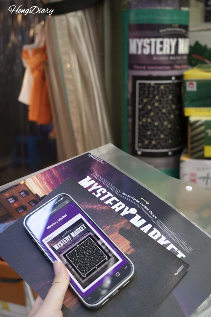 Puzzle poster discovered on a wall inside Bujeon Market during the Mystery Market game