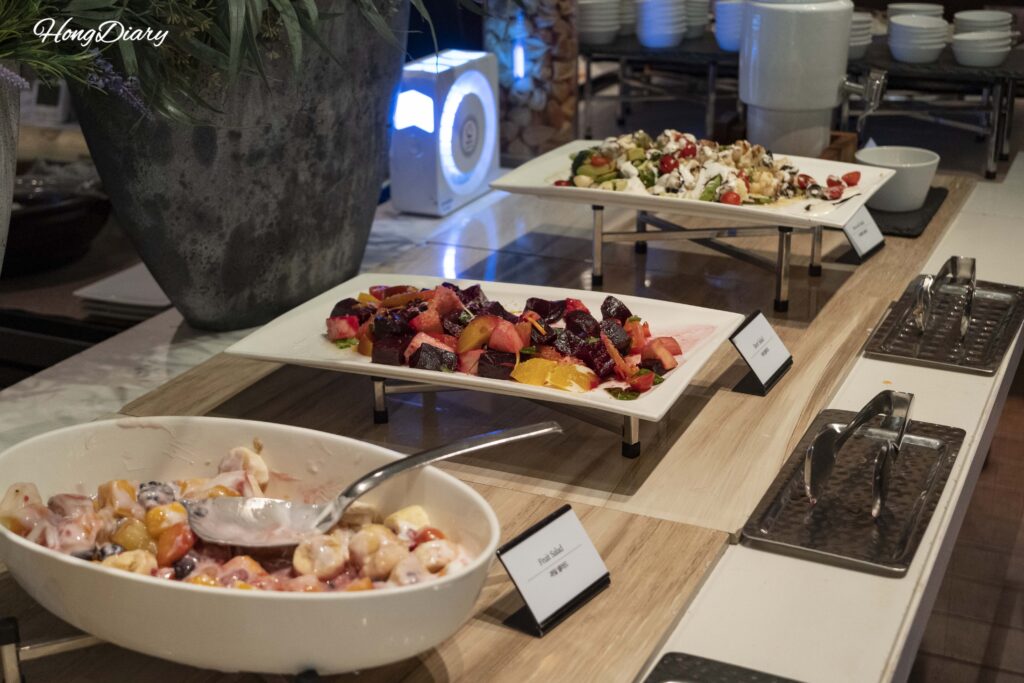 Salad station with mushrooms, seafood, and greens at Ristorante, Hotel Nongshim Busan