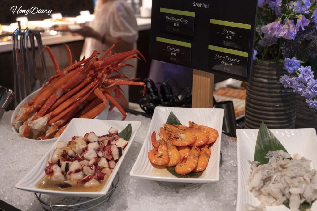 Cangrejo rojo, pulpo y sashimi de lenguado en la estación de mariscos, Ristorante Hotel Nongshim
